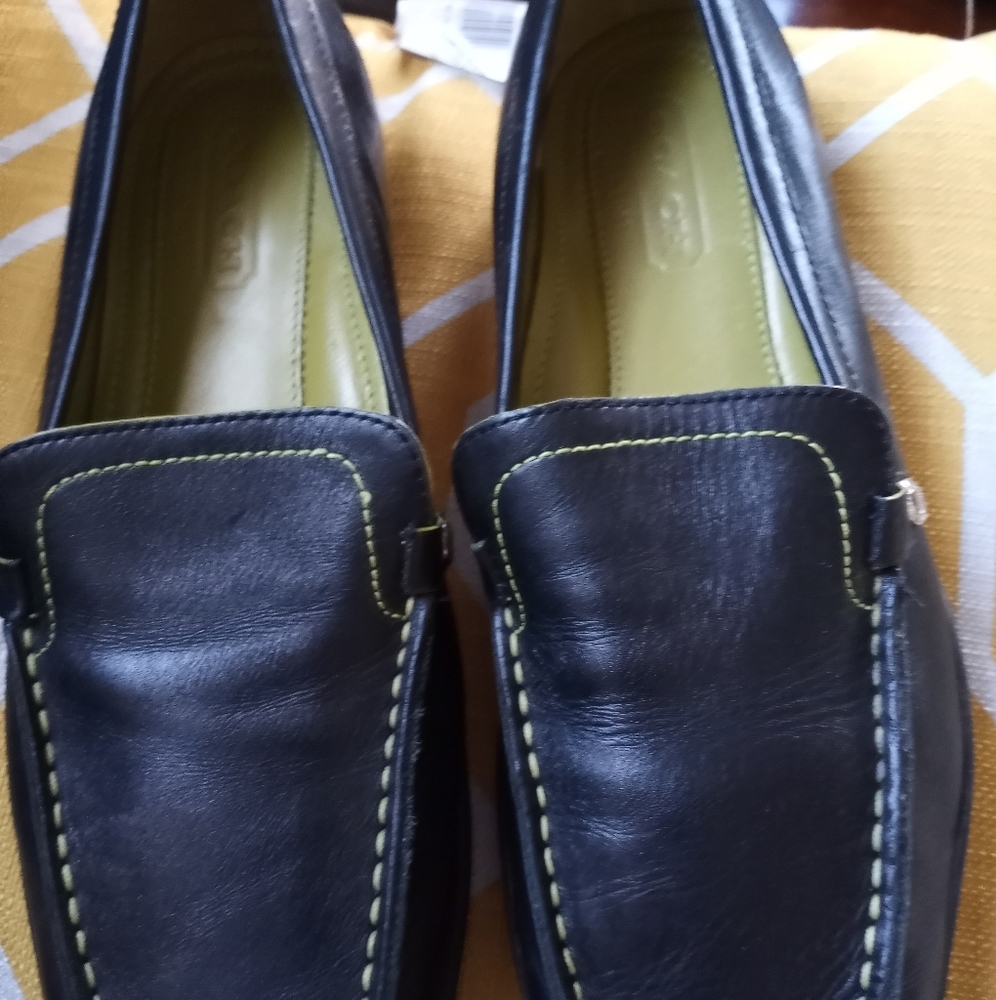 Coach flat shoes size 7.5 never worn .